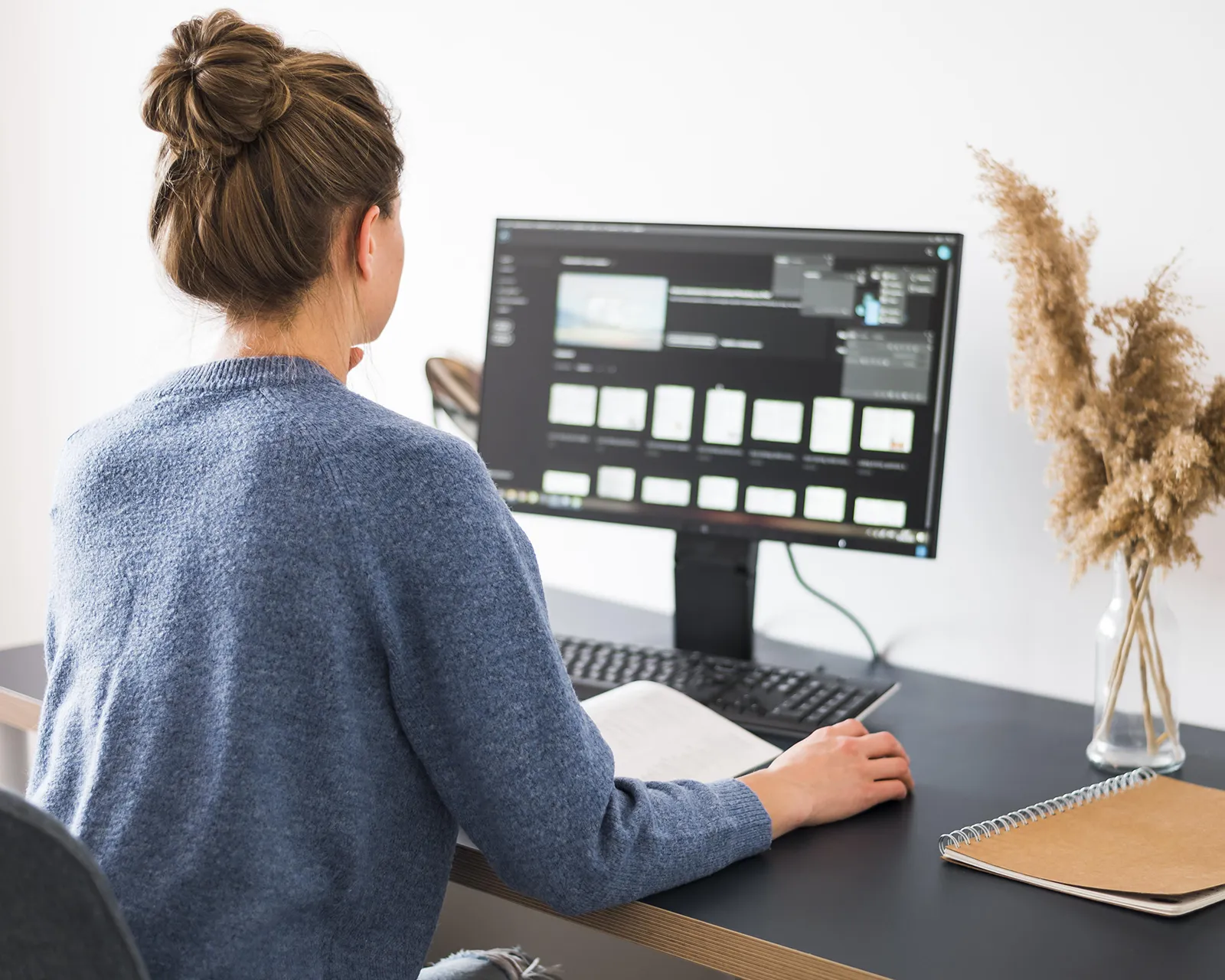 A person at a desk, choosing how an AI employee runs.
